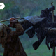 Mani (Mark Dacascos) uses a staff to lift himself and kick some French thugs in Brotherhood of the Wolf.
